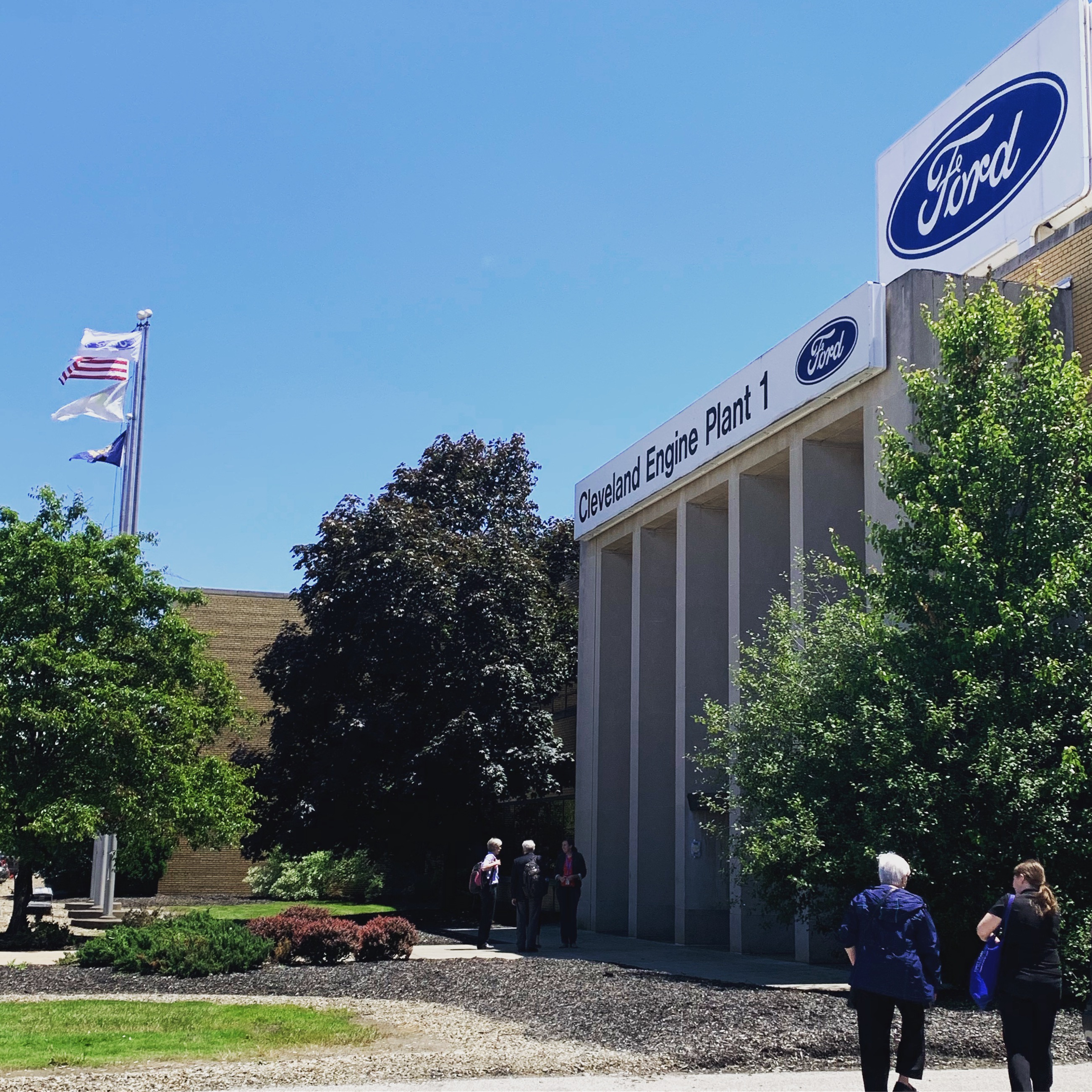 Participants walking toward Cleveland’s Ford engine plant for a meeting with factory staff and management as well as a plant tour.