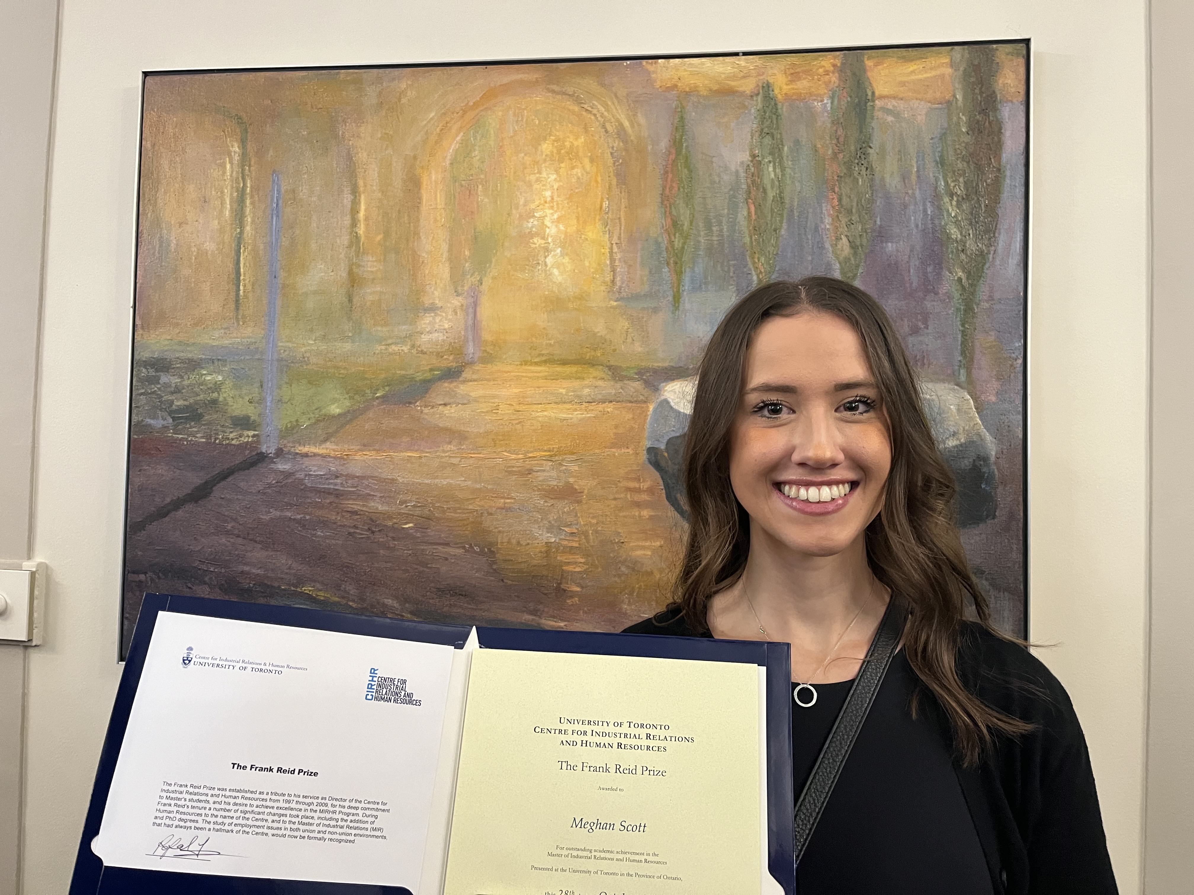 Meghan Scott displays her Frank Reid Prize certificate