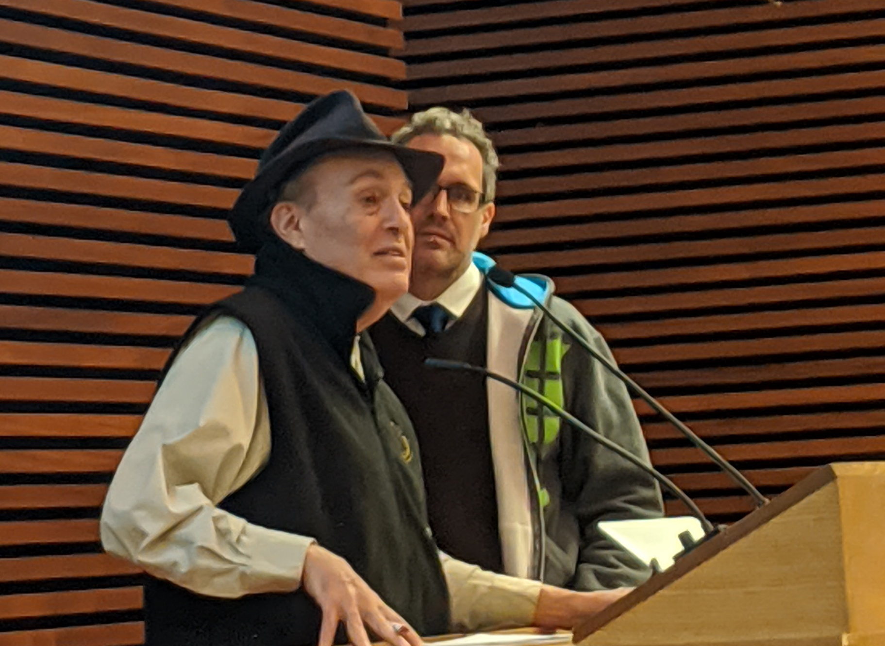 Richard B. Freeman and Rafael Gomez stand at a podium