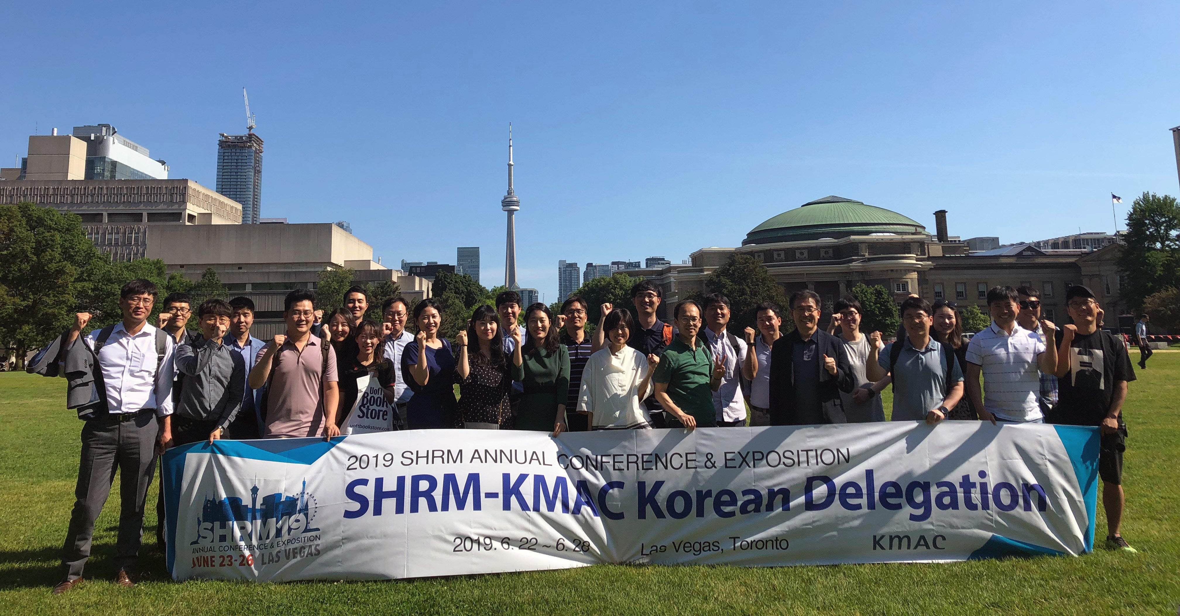 The Korean delegation poses on U of T's Front Campus